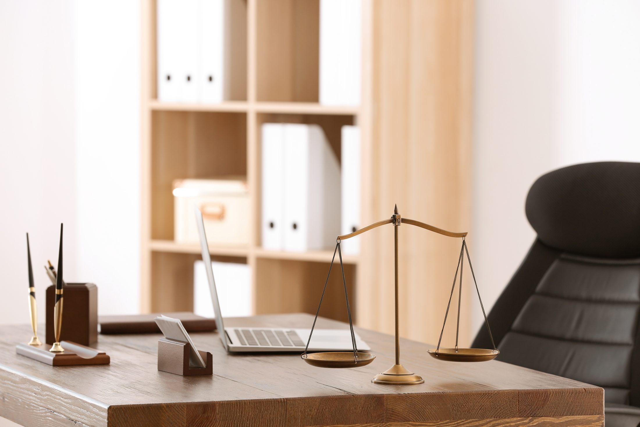 Scales of justice on a legal office desk